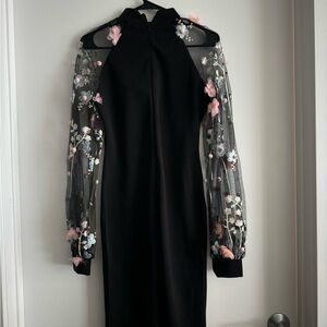 Long black dress with embroidery